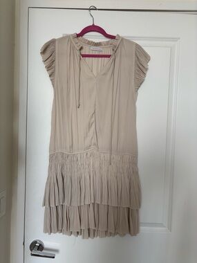 Nude color mini ruffled dress